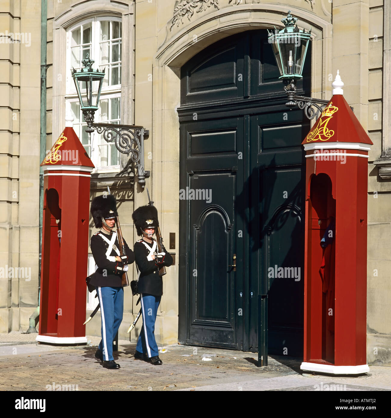 Royal life guards and sentry boxes, Amalienborg palace, Copenhagen, Denmark Stock Photo