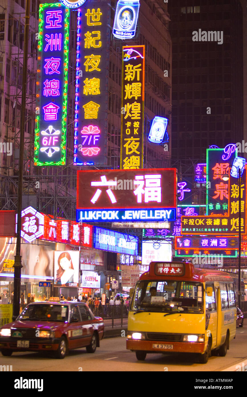 HONG KONG CHINA Colorful neon signs and traffic in busy Mong Kok