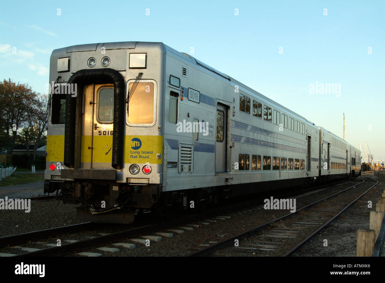 Railroad train departing Greenport Station on Long Island New York USA