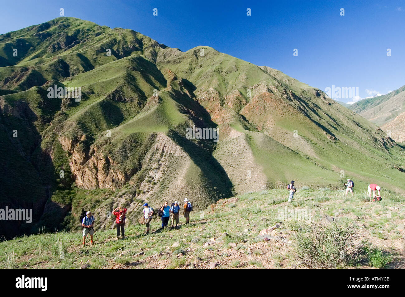 trekking group at Konorchek Canyon Tian Shan Mountains Kyrgyzstan Stock Photo