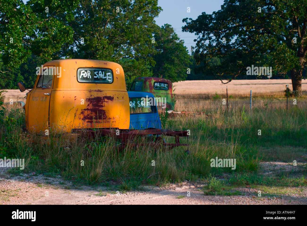 Three abandoned Pickup truck cabs for sale Stock Photo Alamy