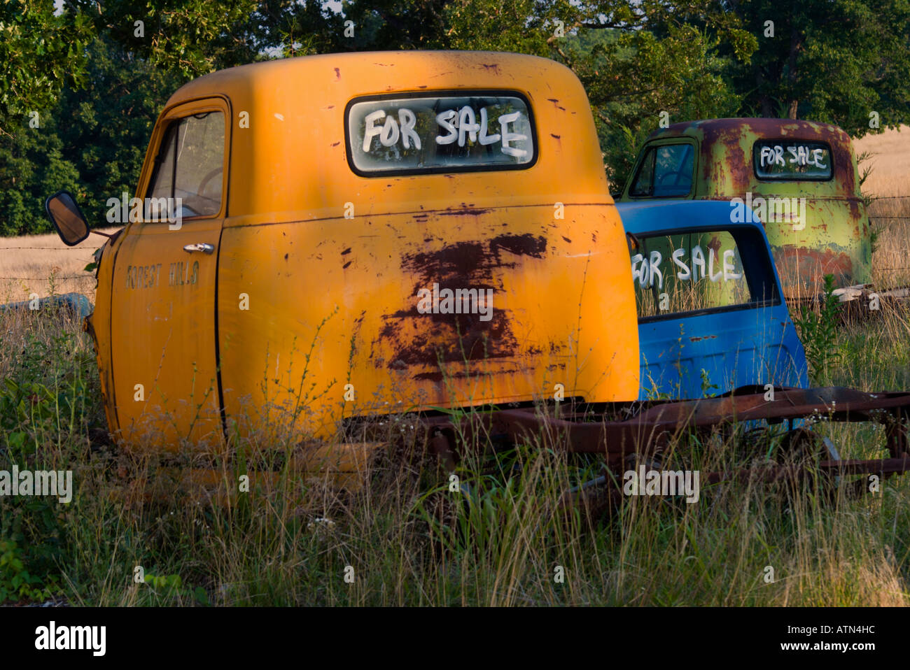 Three abandoned Pickup truck cabs for sale Stock Photo