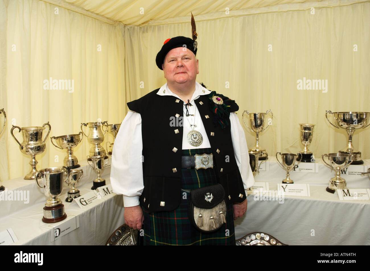 Visitor in traditional full Jacobite regalia, in the trophy pavilion at the annual Cowal Highland Gathering at Dunoon, Scotland Stock Photo