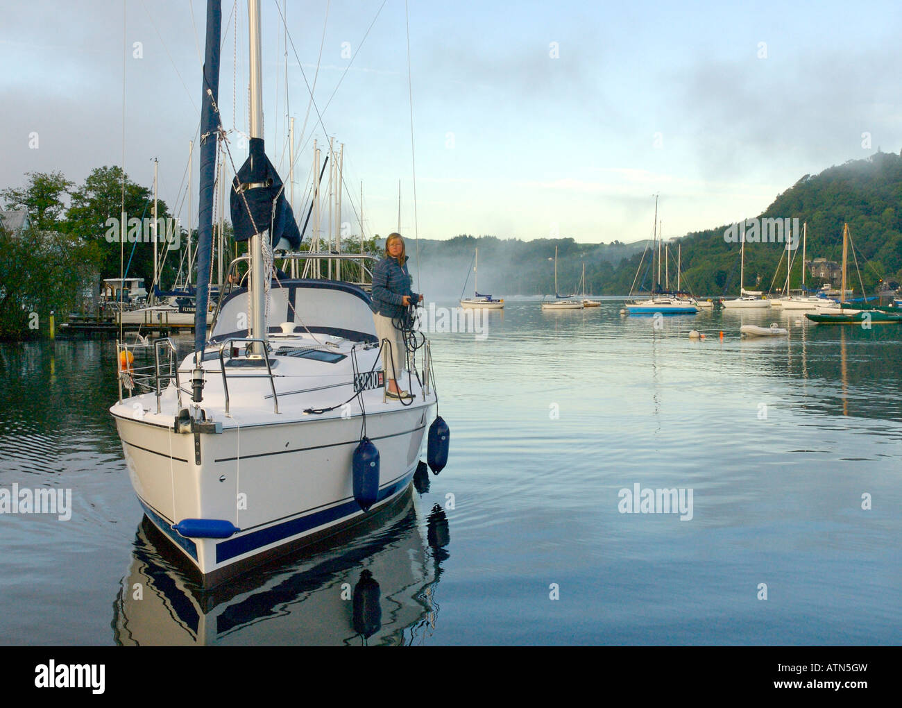 Yacht mooring near Bowness on a misty morning, Lake Windermere, Lake