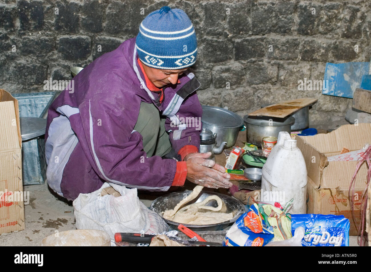 trekking cook making noodles Markha valley Ladakh Jammu and Kashmir India Stock Photo