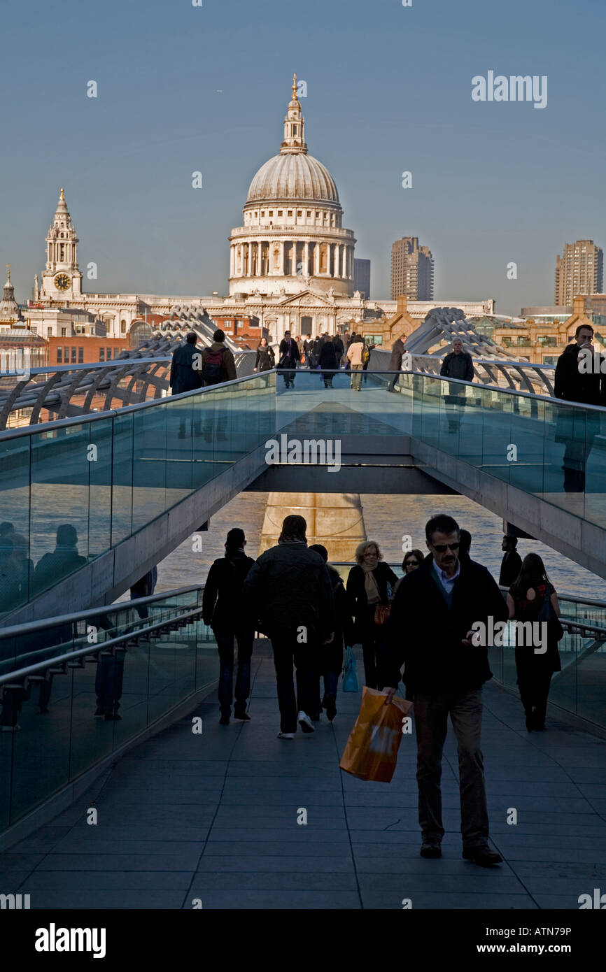 People Crossing Millenium Bridge St Pauls London England Stock Photo