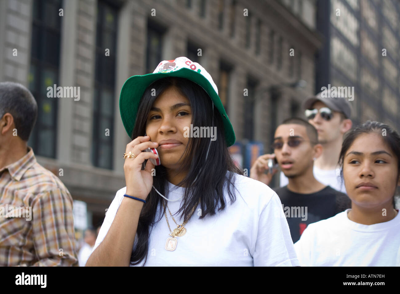 Hispanic woman talking on a cell phone Stock Photo - Alamy
