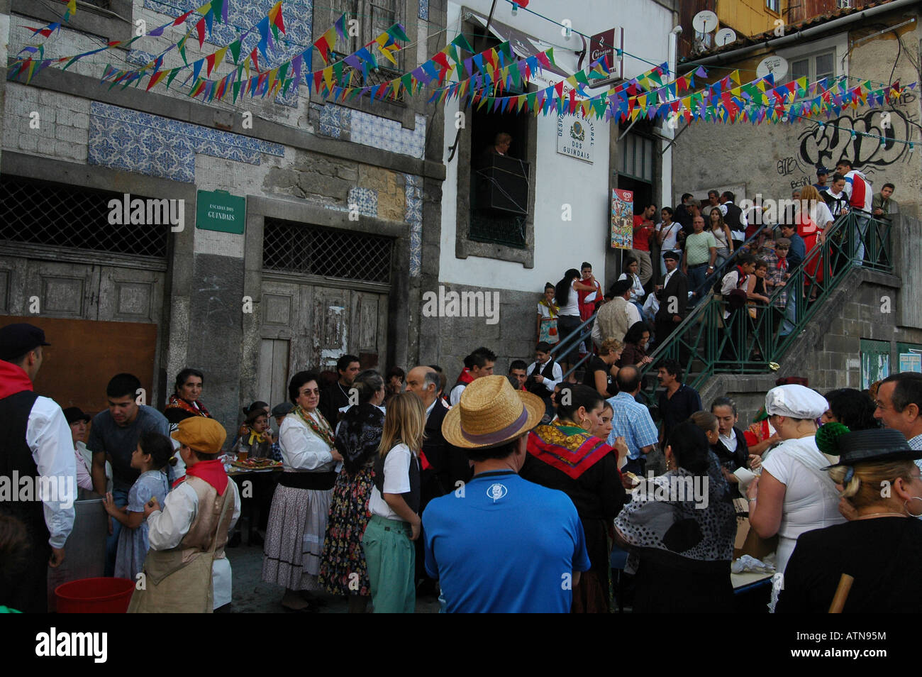 Members of the Gypsy community celebrating Festa de Sao Joao do Porto or Festival of St John in the city of Porto northern Portugal Stock Photo
