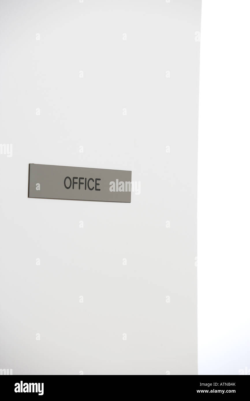 A office sign on a door in a hallway Stock Photo