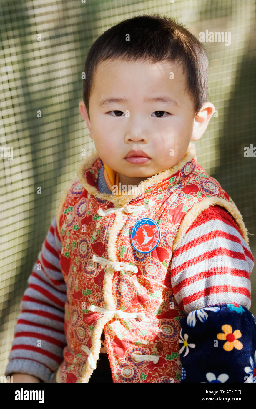 Young Chinese Boy Portrait, Xishuangbanna, Yunnan Province, China Stock Photo