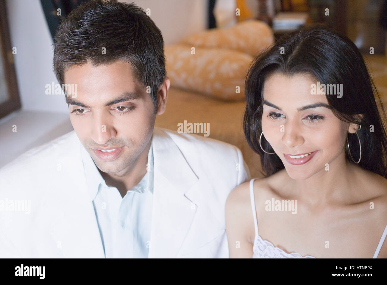 Excited young indian couple hi-res stock photography and images - Alamy