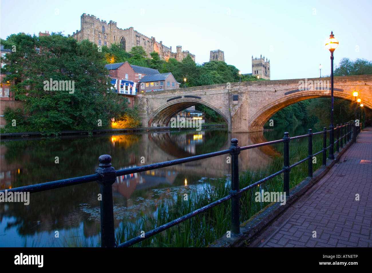 Durham, County Durham, England. View from west bank of the River Wear below Framwellgate Bridge, dusk. Stock Photo