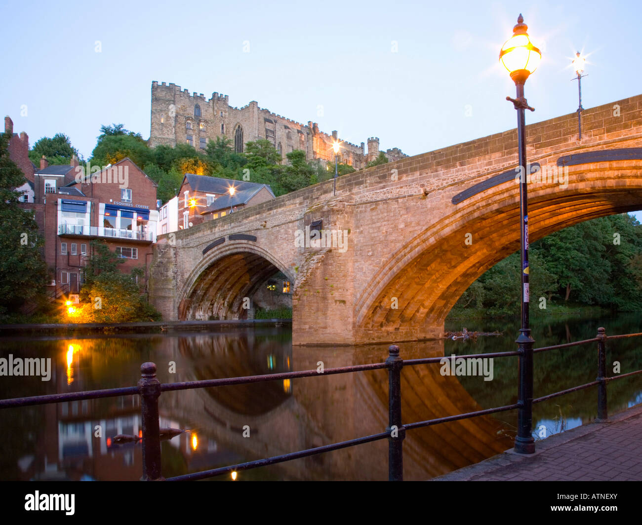 Durham, County Durham, England. View to the castle from west bank of the River Wear below Framwellgate Bridge, dusk. Stock Photo