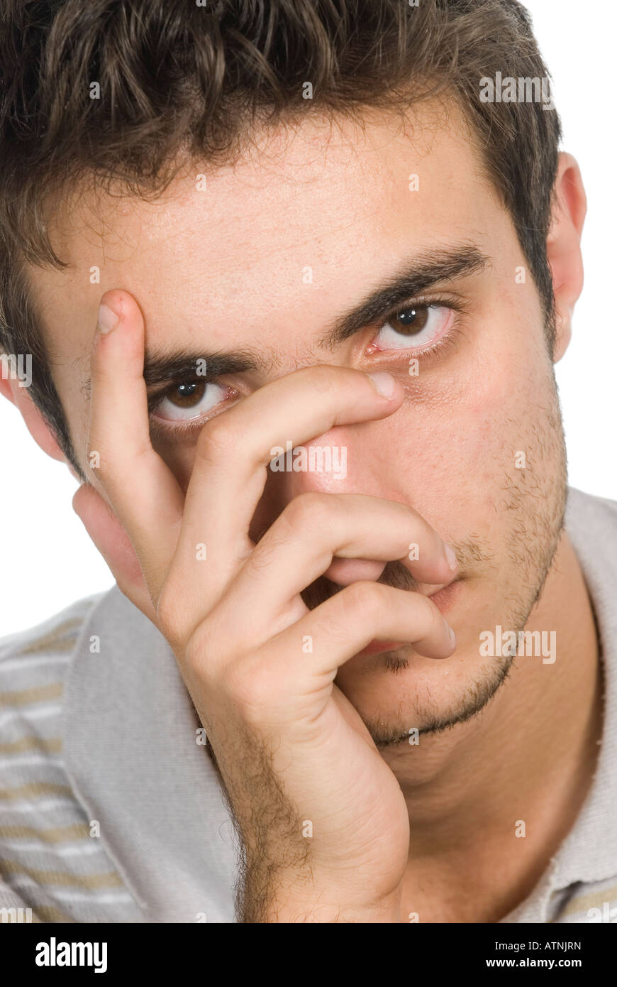 Young man hand covering face Stock Photo - Alamy