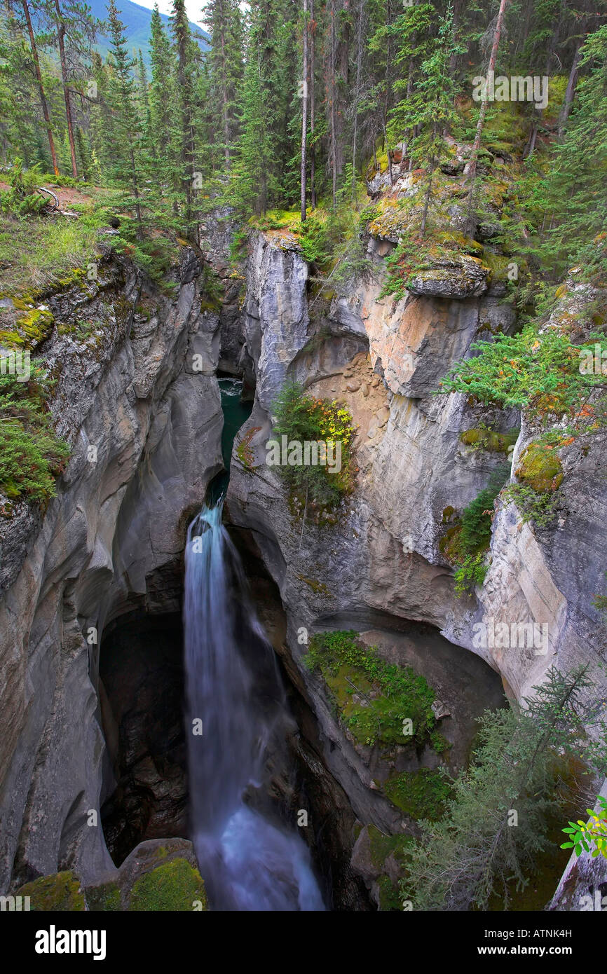 A falls in a narrow and deep canyon in the north of Canada Stock Photo