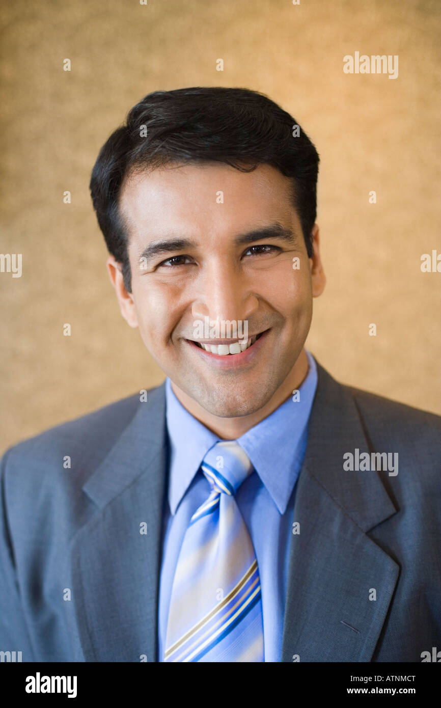 Portrait of a businessman smiling Stock Photo - Alamy