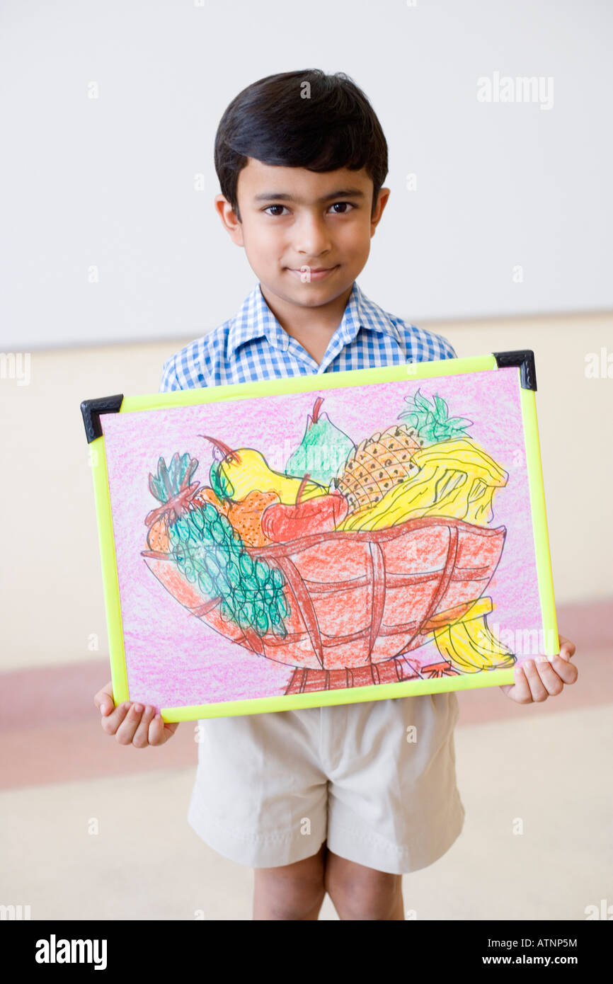 Child holding up painting hi-res stock photography and images - Alamy