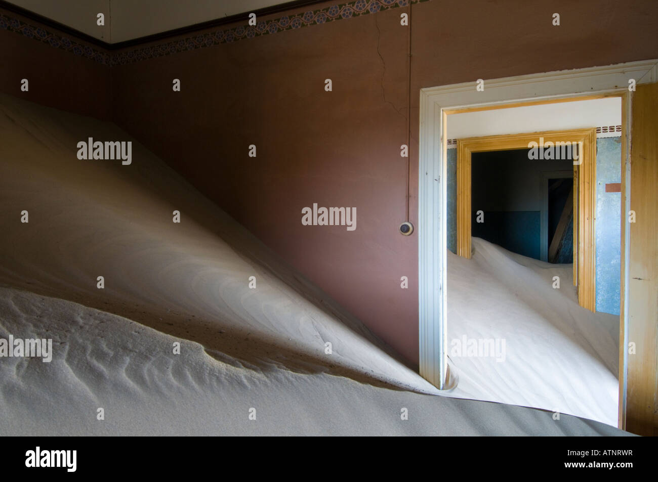 Home interior Kolmanskop the abandoned ghost town in the Namib Desert which began in 1908 to mine the diamonds Stock Photo