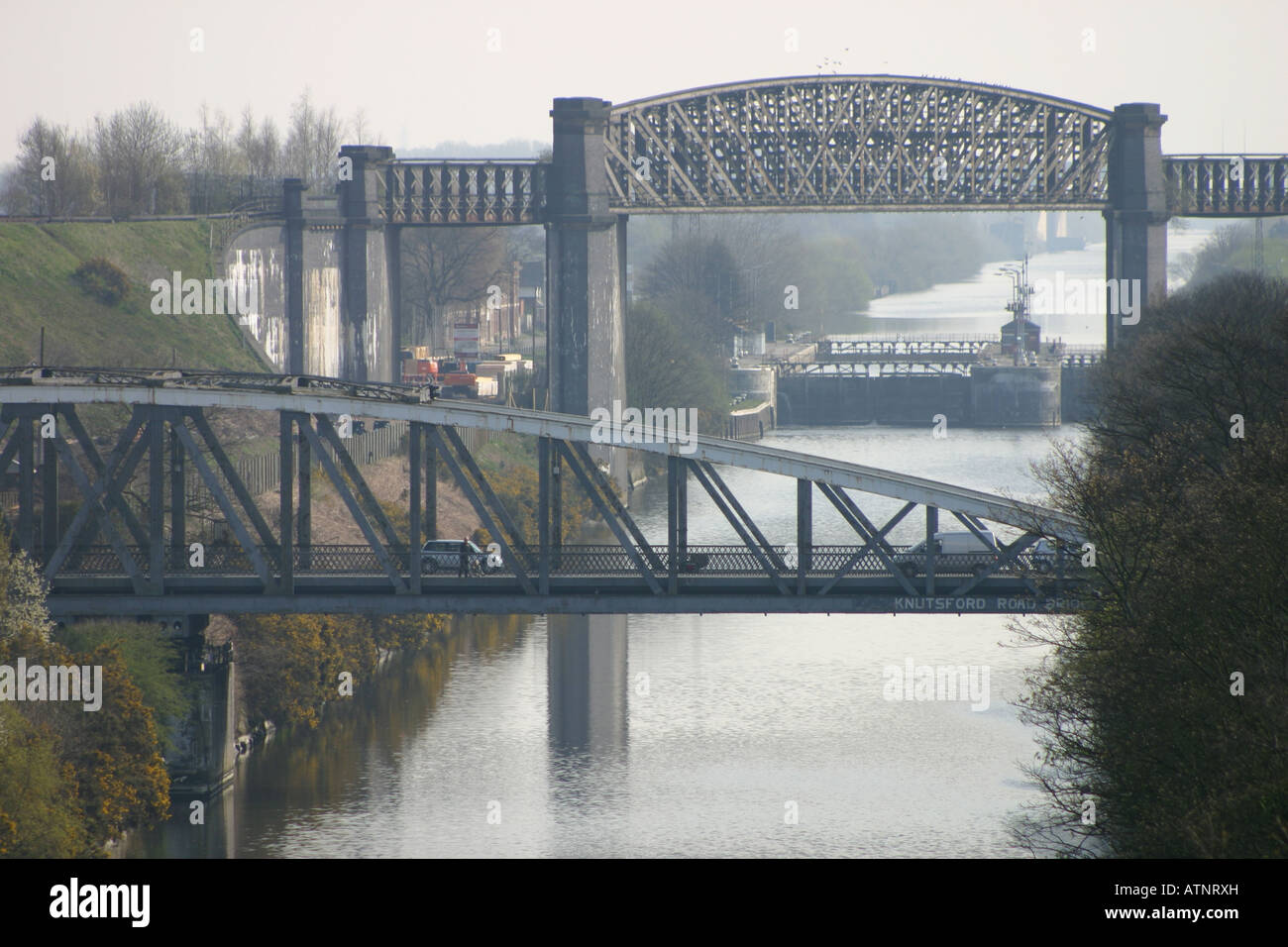 victorian metal girder canal bridges contre jour Stock Photo