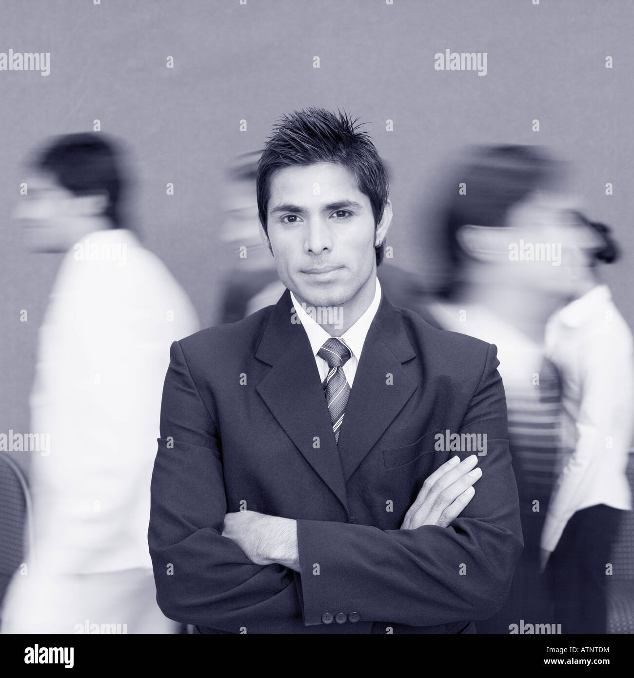 Portrait of a businessman standing with his arms crossed Stock Photo ...