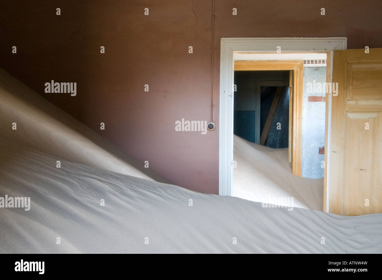 Home interior Kolmanskop the abandoned ghost town in the Namib Desert which began in 1908 to mine the diamonds Stock Photo