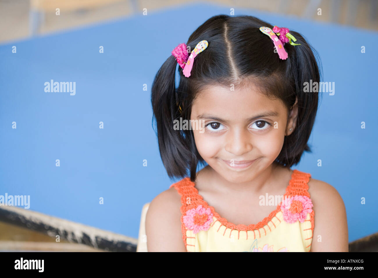 Portrait of a schoolgirl smiling Stock Photo - Alamy