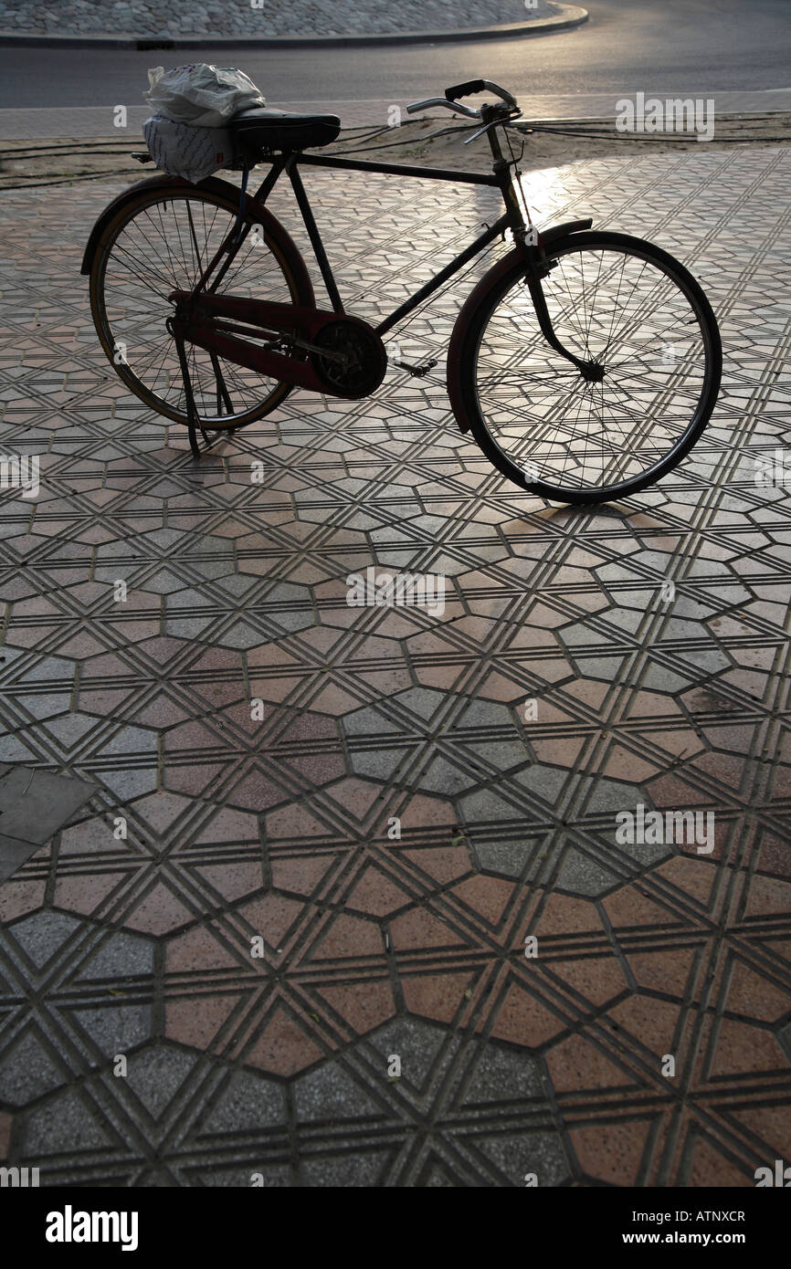 Docker's bicycle parked by Deira Creek, Dubai Stock Photo