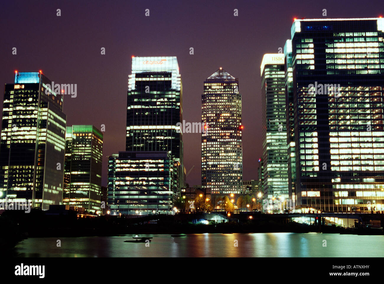 london docklands canary wharf high rise tower blocks night reflections ...