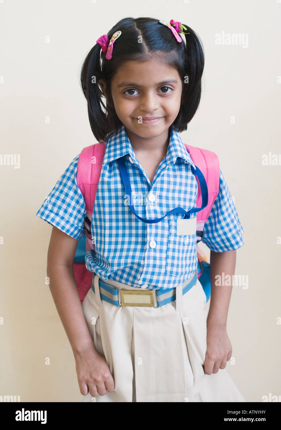 Portrait of a schoolgirl smiling Stock Photo - Alamy