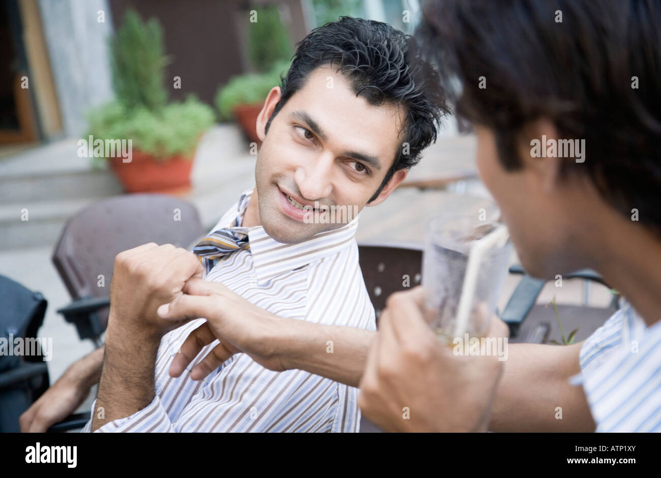 Close-up of two young men smiling Stock Photo - Alamy