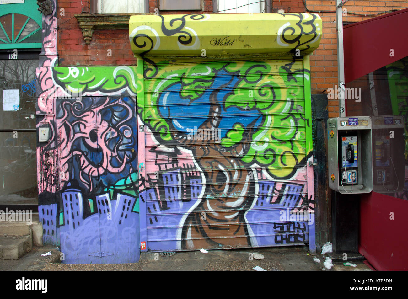 The entrance of a building on the Lower East Side of NYC covered with graffiti Stock Photo