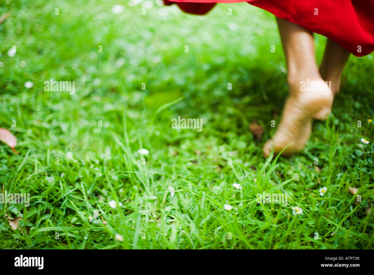 Dancing feet in red sari Stock Photo