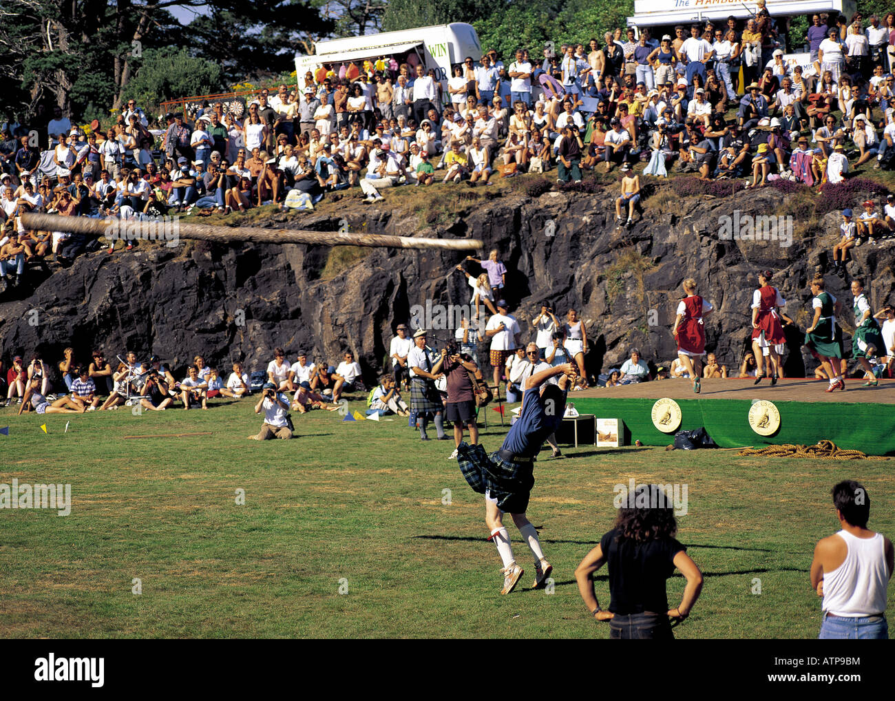 Tossing the caber at Portree highland games on Isle of Skye, Scotland