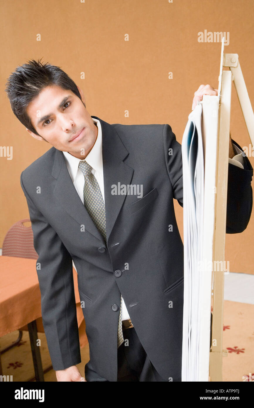 Portrait of a businessman standing near a whiteboard Stock Photo - Alamy