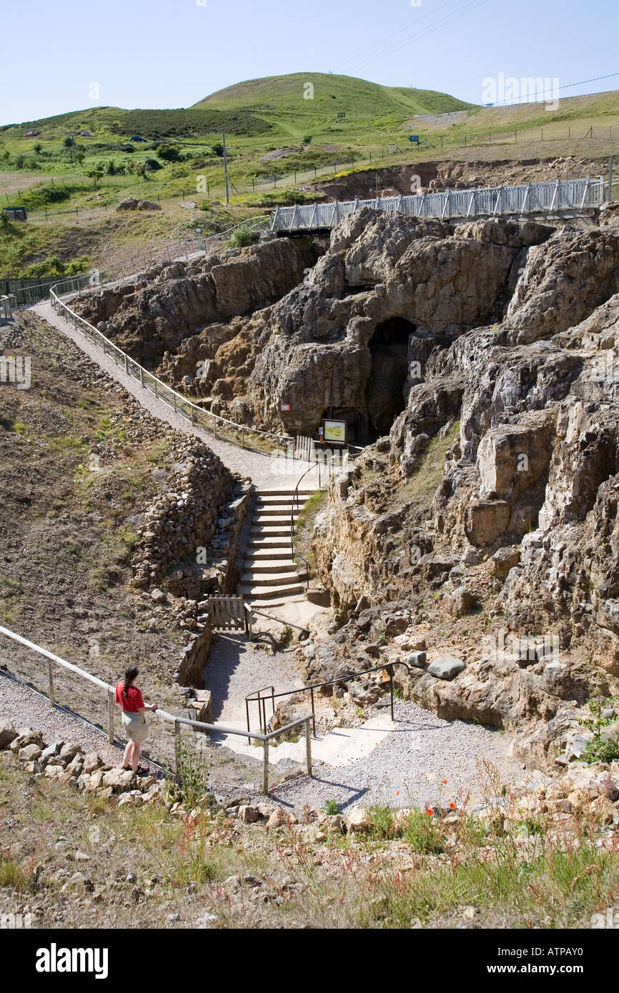 Woman visitor at the Great Orme Ancient Copper Mines excavation Llandudno Wales UK Stock Photo