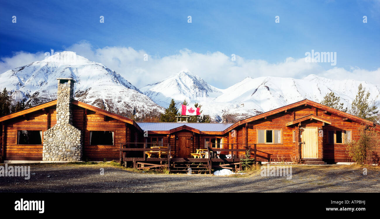 Dalton Trail Lodge in The Yukon, Canada, with the first snows covering the mountains in the background Stock Photo