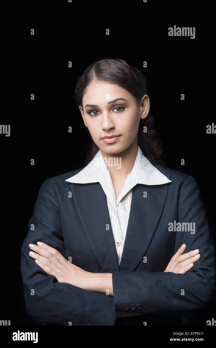 Portrait of a businesswoman with her arms crossed Stock Photo - Alamy