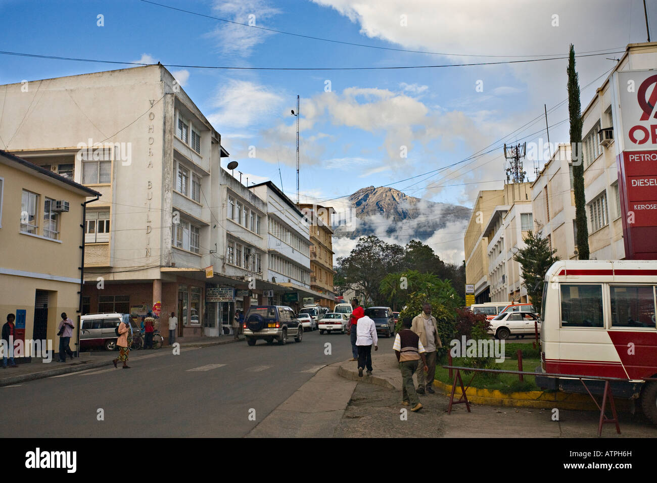 One of the streets of Arusha with Mt. Meru in the background, Tanzania, Africa Stock Photo