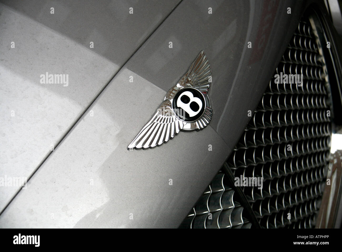 Badge logo on bonnet of Bentley luxury car in London: EDITORIAL USE ONLY Stock Photo