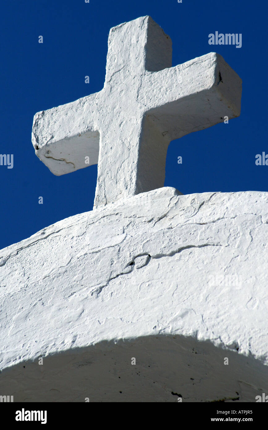 cross on top of a white greek church, St Paul's Bay Church, Lindos ...