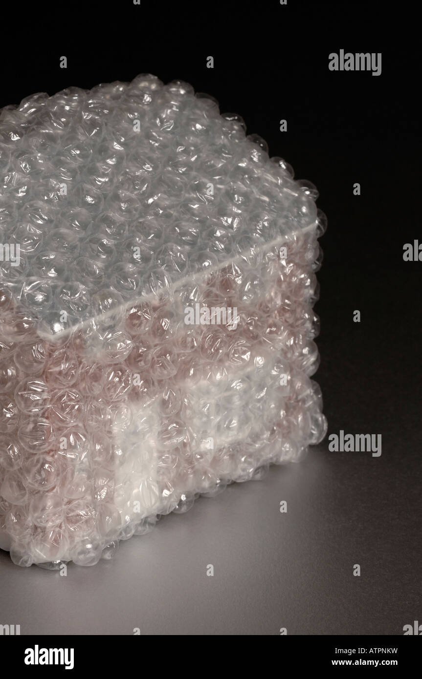 Model house wrapped in bubble wrap Stock Photo