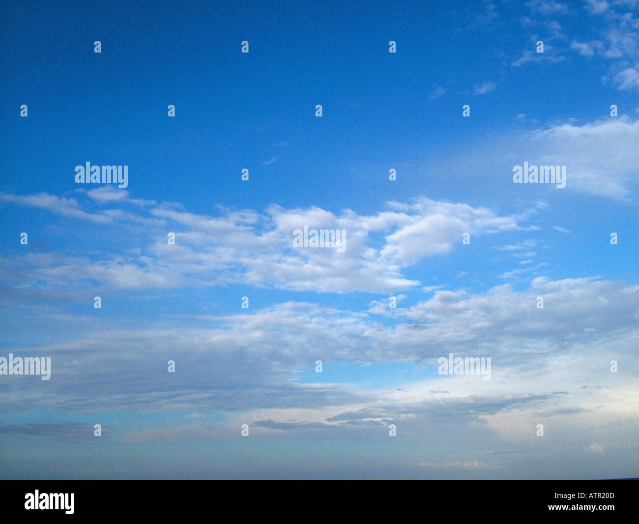 White clouds against blue sky Stock Photo - Alamy