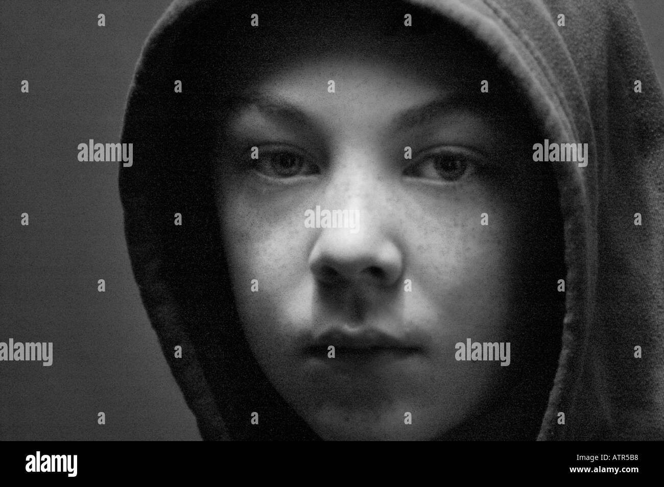 12 year old boy wearing hoodie Stock Photo