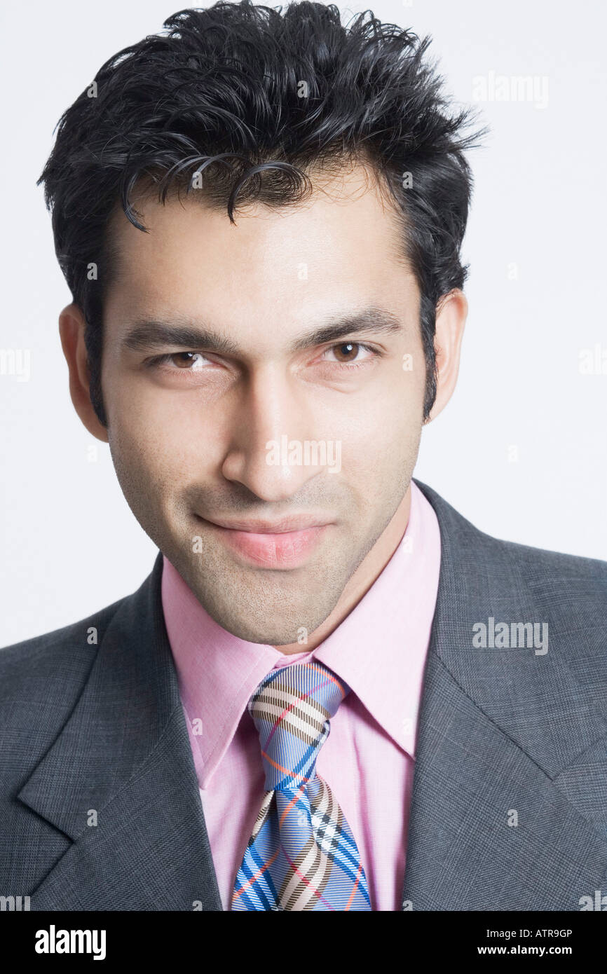 Portrait of a businessman smiling Stock Photo - Alamy