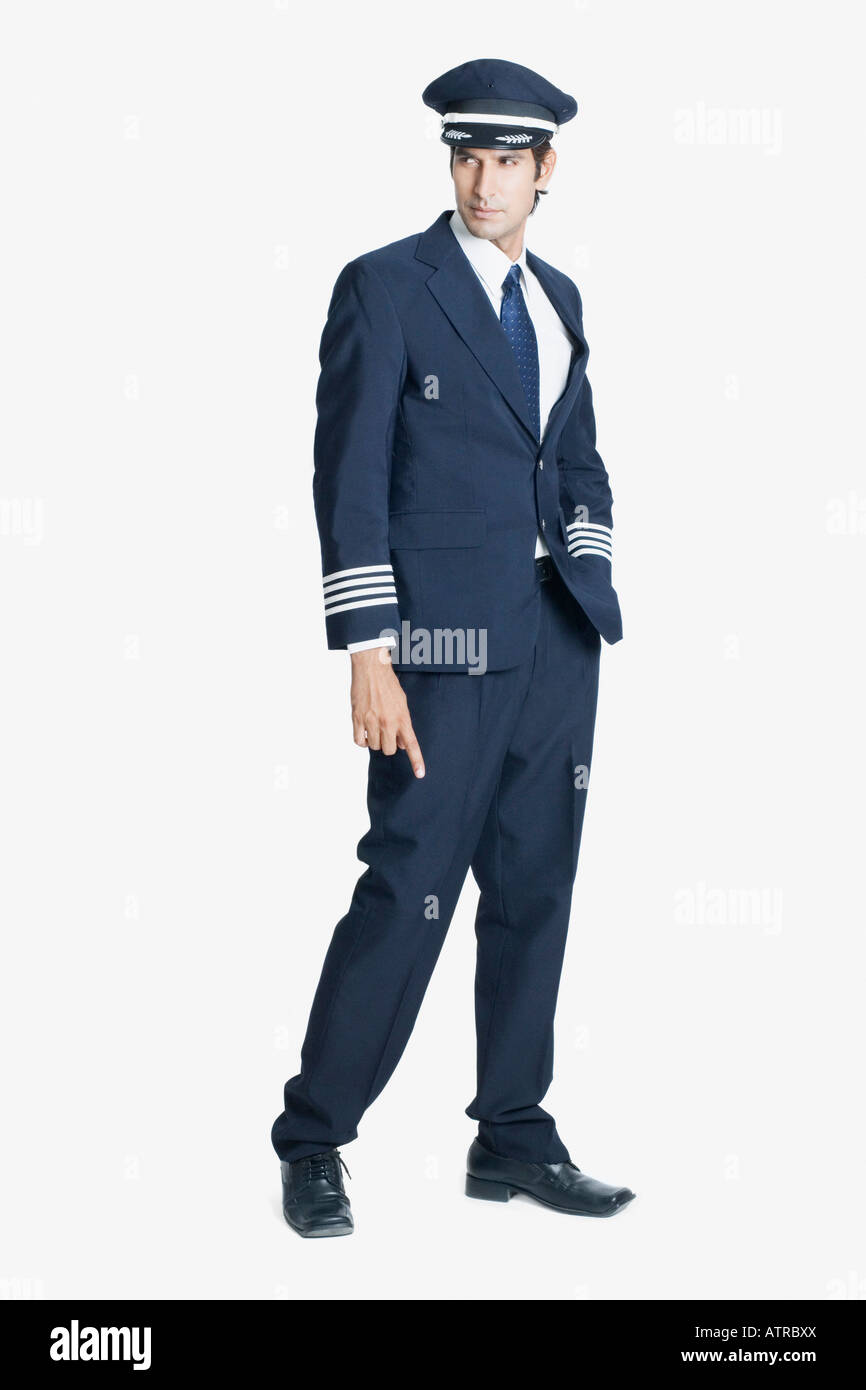 Pilot standing with his hand in his pocket Stock Photo - Alamy