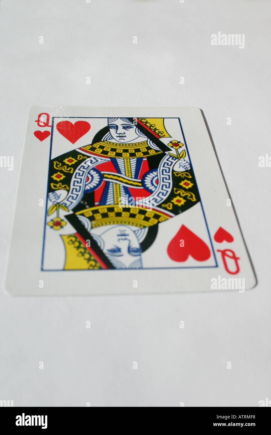 Queen of hearts card from deck of cards on plain background Stock Photo Alamy