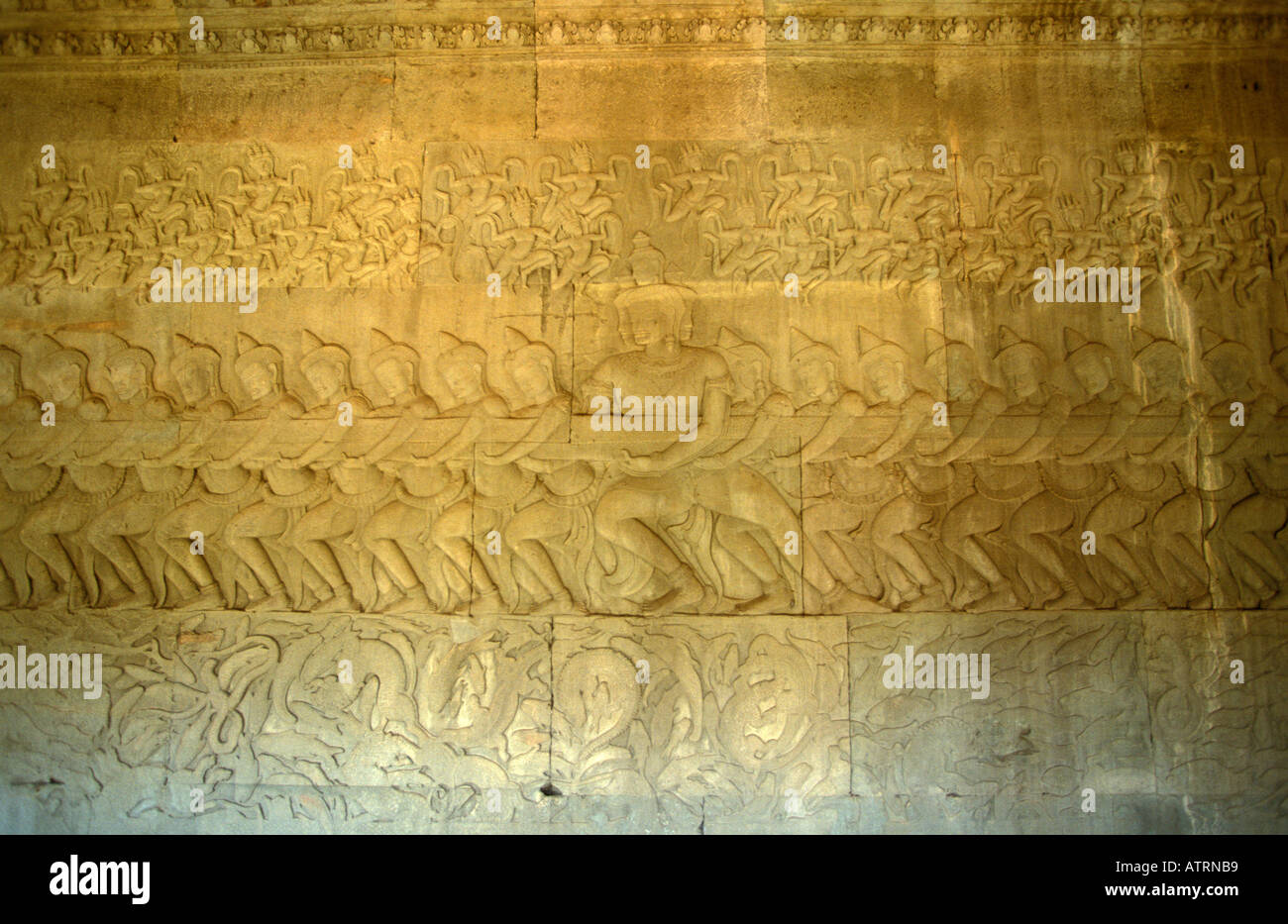 Angkor bas reliefs of Hindu myths at temple of Angkor Wat Stock Photo