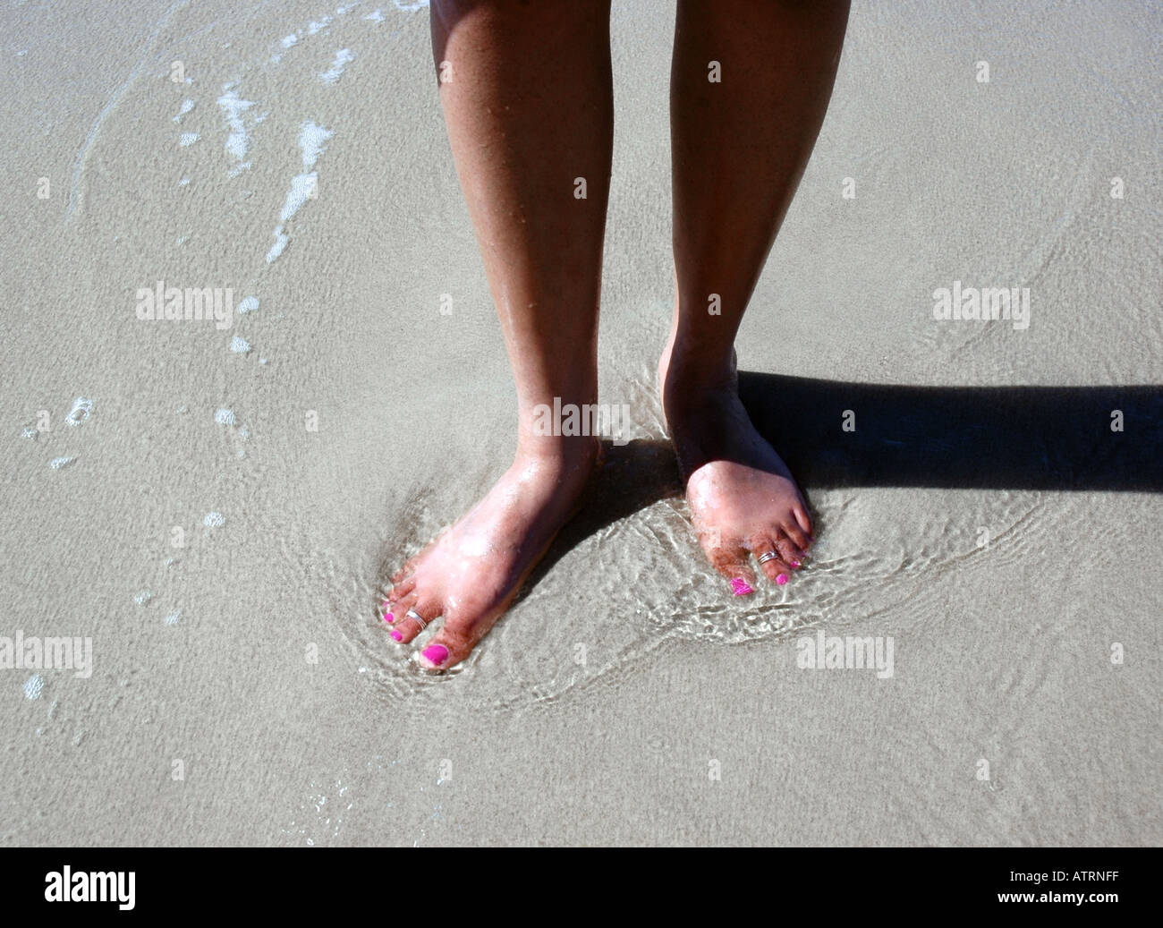 Woman Standing On Beach Stock Photo Alamy