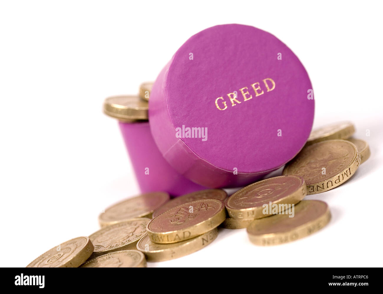 Gold Coins in Box Labelled Greed Stock Photo Alamy