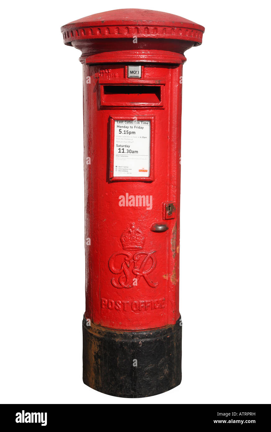 Red British post box isolated on a white background. Stock Photo